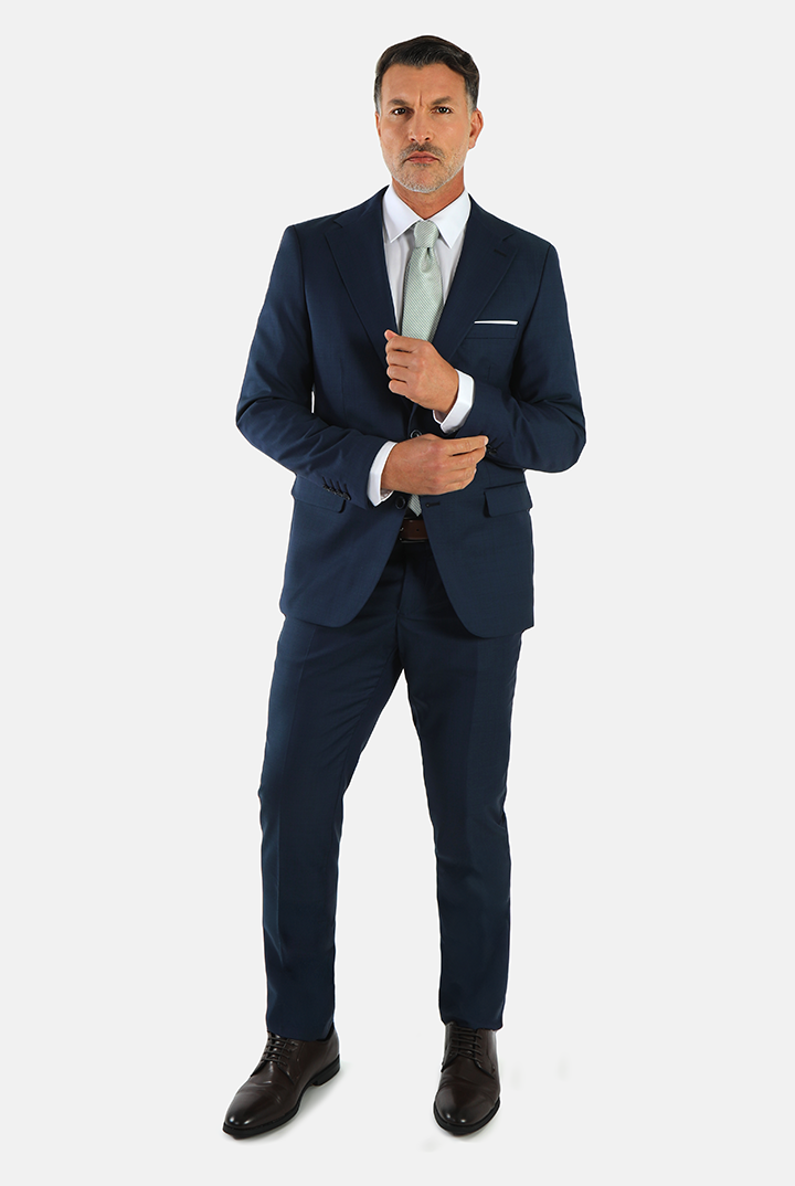 alt="DKS navy slim fit fresco formal suit front view with two button jacket"