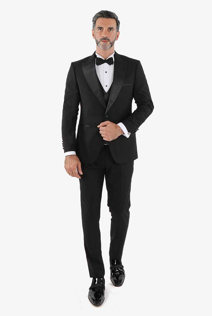alt="DKS black slim solid tuxedo suit with vest front view"