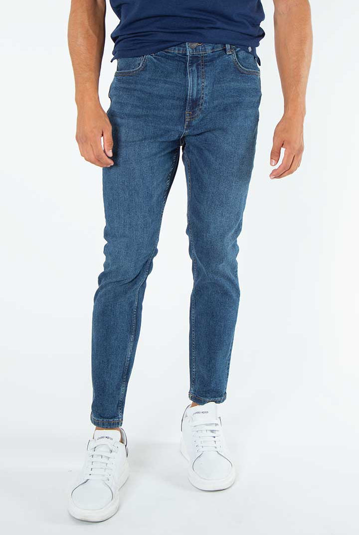 alt="Francisco Tolli navy blue carrot denim jeans front view"