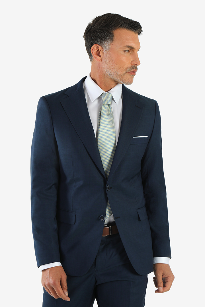 alt="DKS navy slim fit fresco formal suit close view with two button jacket"