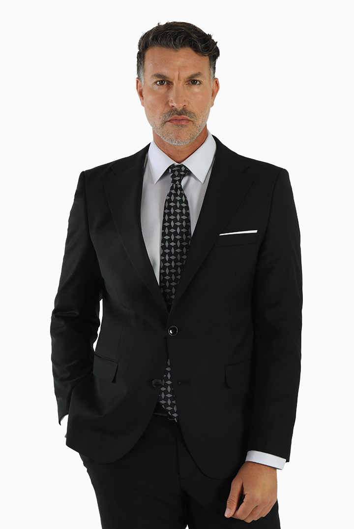 alt="DKS black slim solid formal suit front close view with two button jacket"