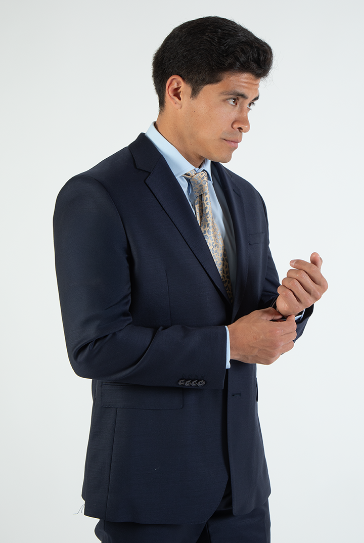 alt="DKS navy slim twill formal side front view with two button jacket"