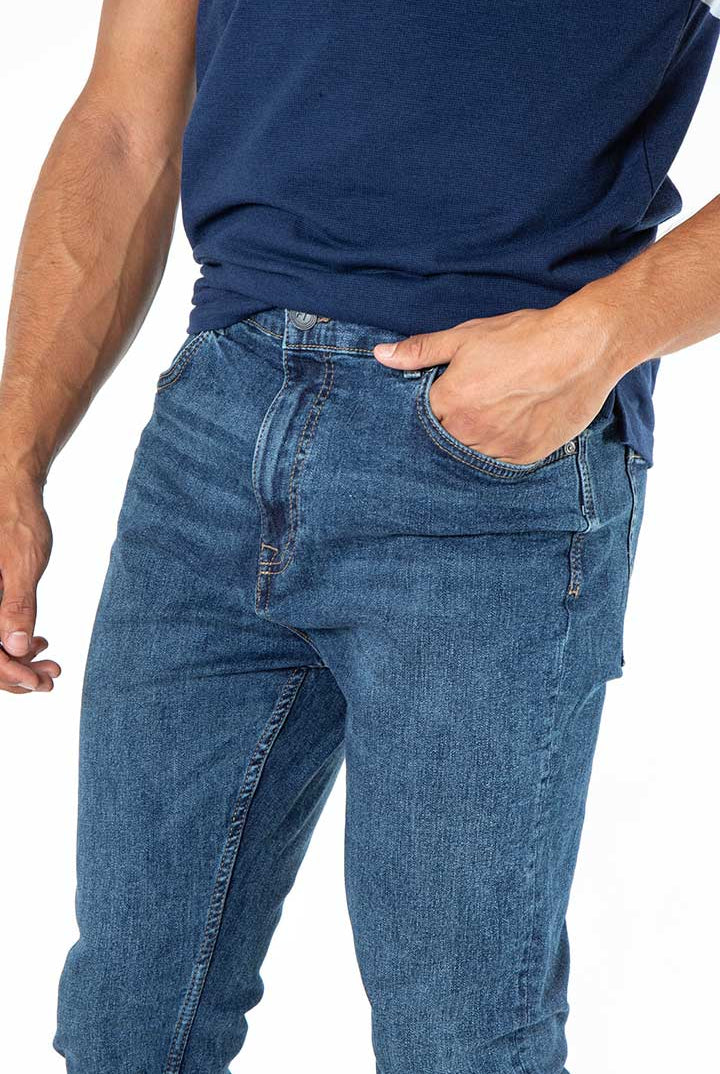 alt="Francisco Tolli navy blue carrot denim jeans front close view"