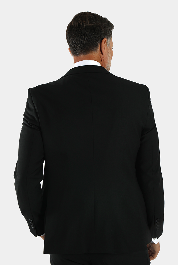 alt="DKS black slim solid formal suit back view"