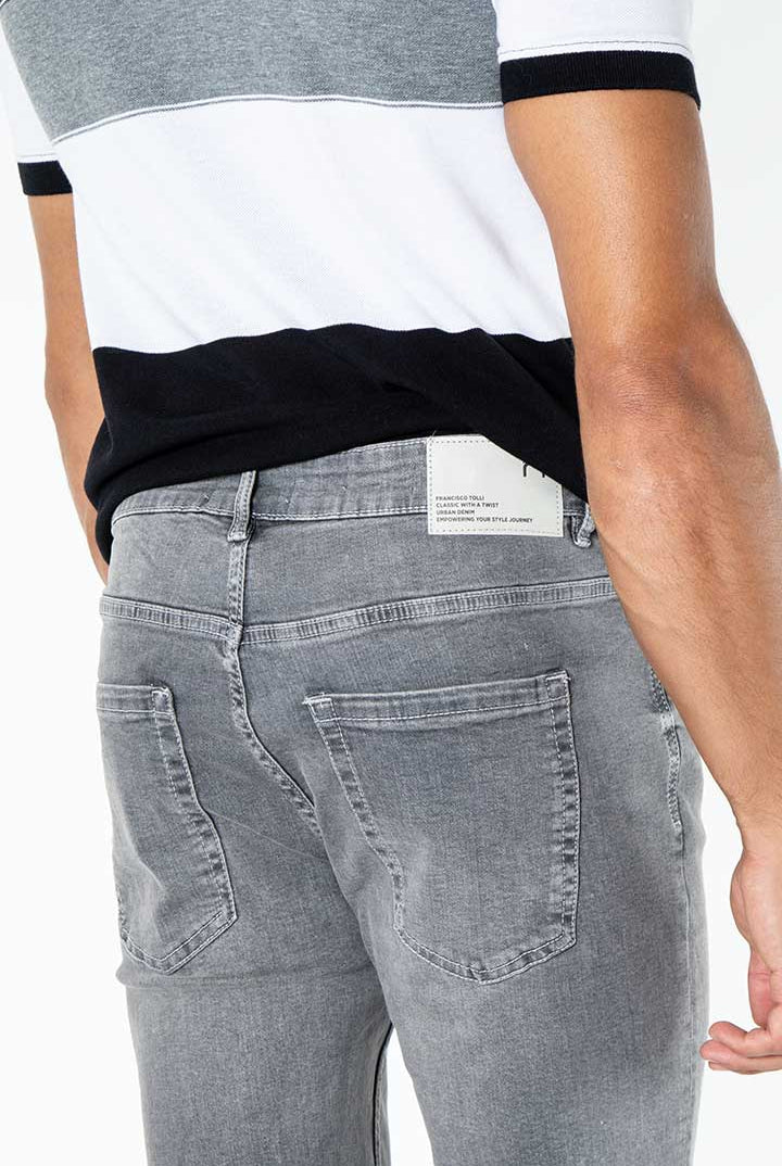 alt="Francisco Tolli grey carrot denim jeans back view"