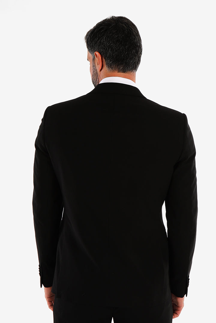 alt="Mosaique black slim solid formal suit back view on model"
