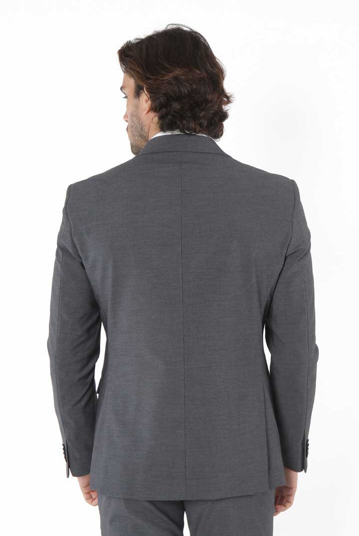 alt="Mosaique grey slim solid formal suit back view on model"