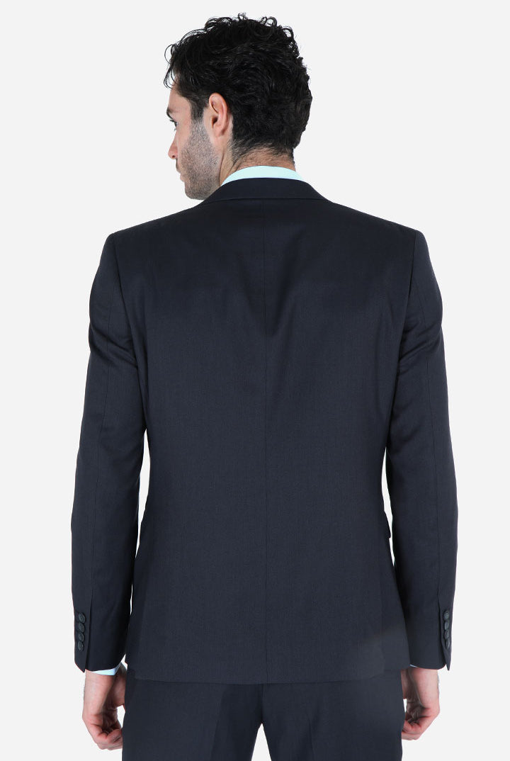 alt="Francisco Tolli charcoal slim plain formal suit back view"