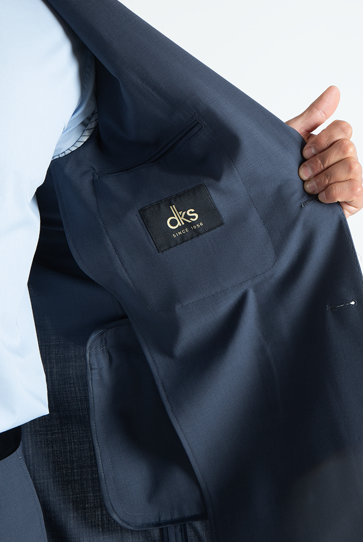 alt="DKS slim fresco suit formal 2 button 2 vent navy side pocket view"