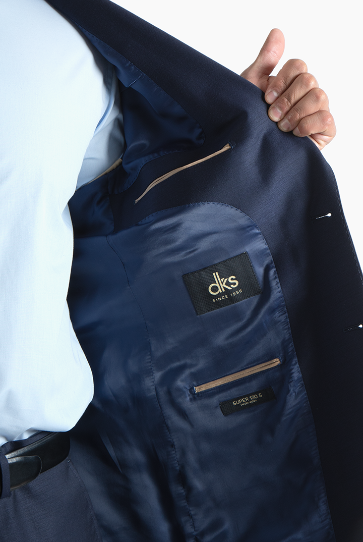 alt="DKS navy slim twill formal suit inner pocket and lining detail"