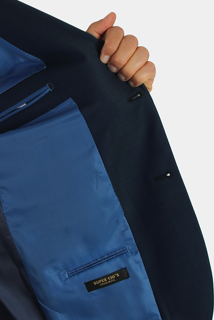 alt="DKS navy slim fit fresco formal suit left inner pocket and lining detail"