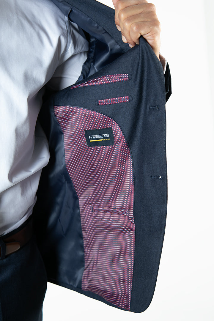 alt="FRANCISCO TOLLI regular solid suit formal 2 button 2 vent navy side pocket view"