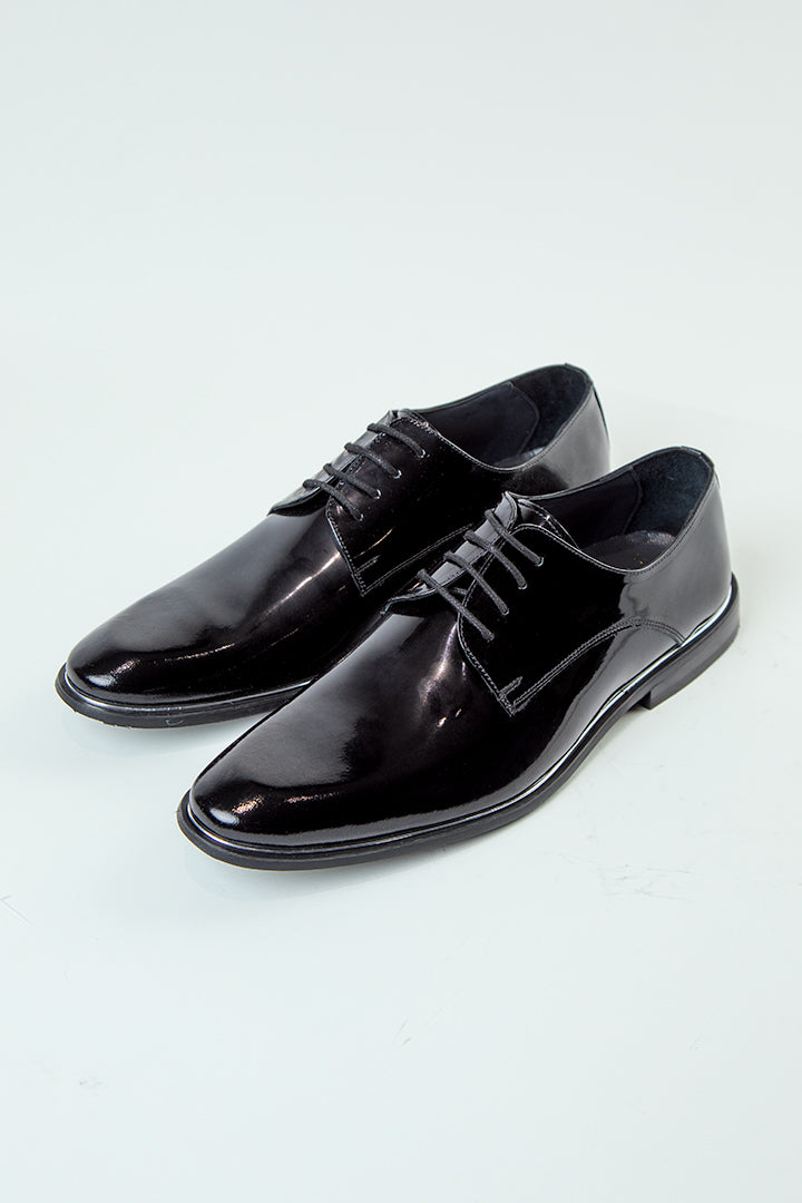 alt="DKS regular tuxedo shoe black patent leather front view"