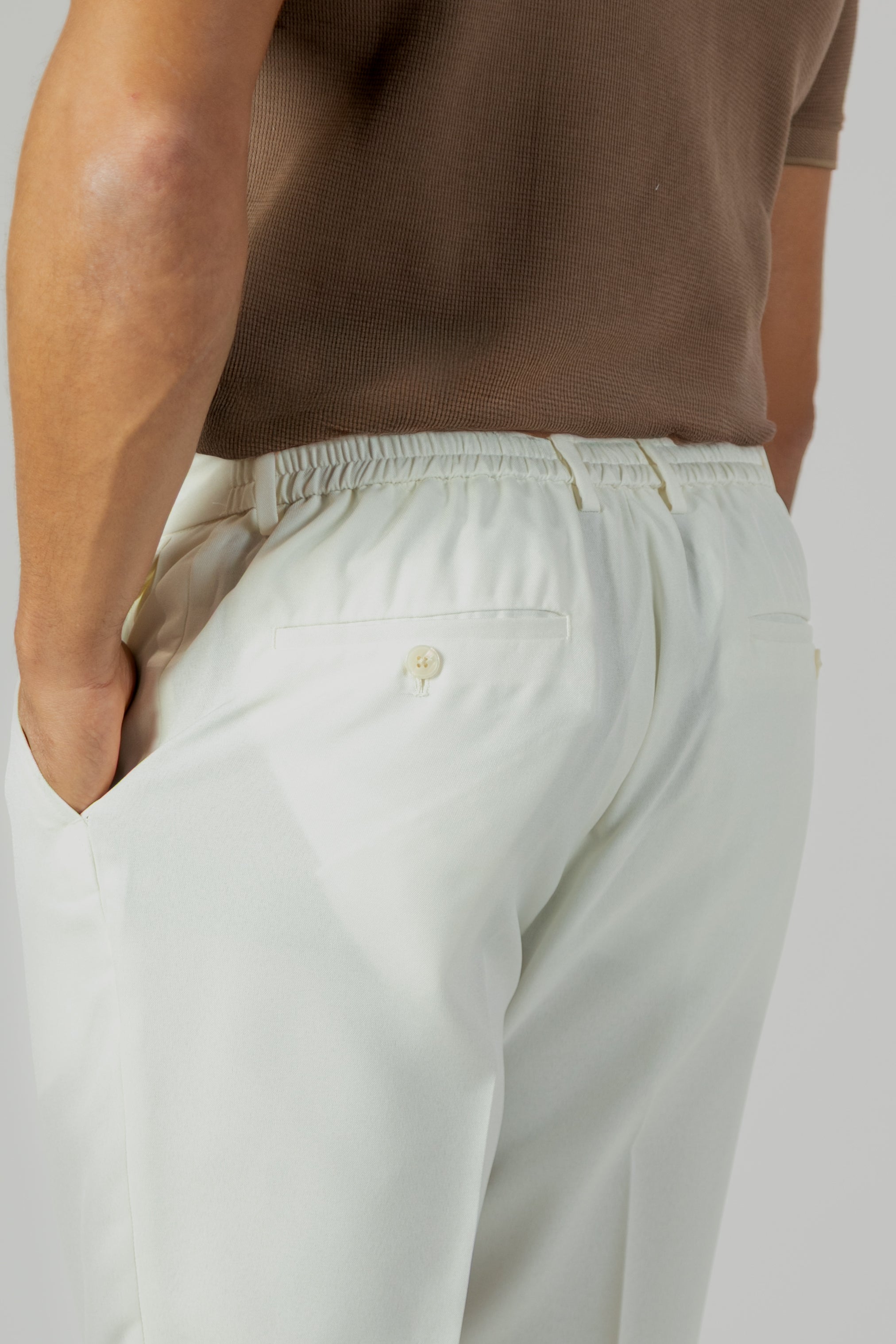 alt="Jack Morgan off white slim fresco trouser formal with drawstring back view"