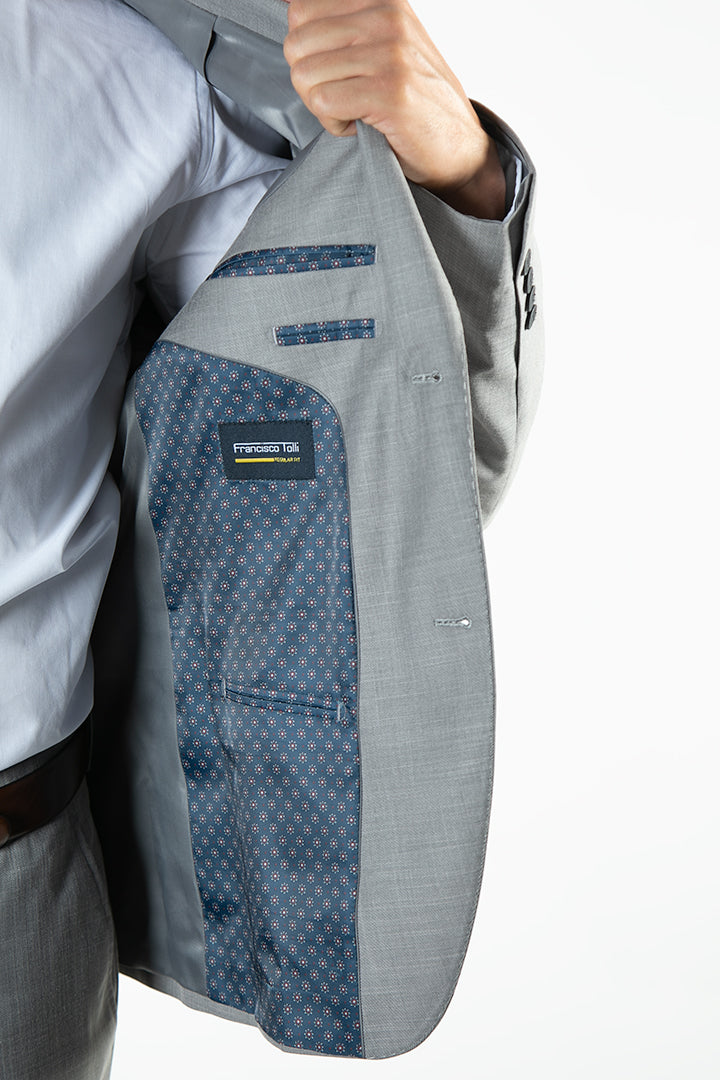 alt="FRANCISCO TOLLI regular solid suit formal 2 button 2 vent light grey side pocket view"