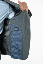 alt="FRANCISCO TOLLI slim solid suit formal 2 button 2 vent dark grey side pocket view"