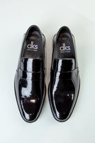 alt="DKS regular tuxedo shoe black patent leather top view"