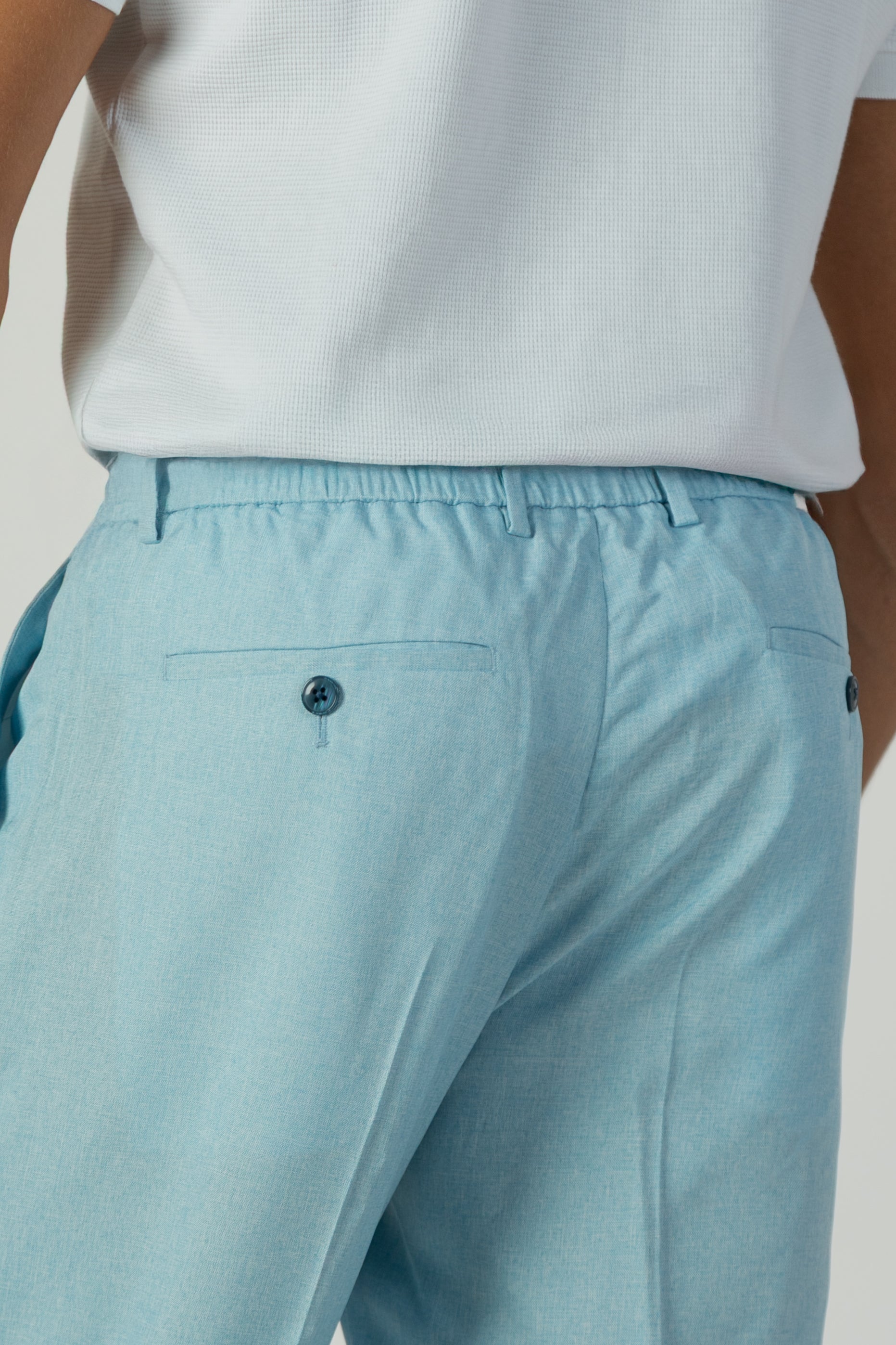 alt="Jack Morgan sky blue slim fresco trouser formal with extended tab closure back view"