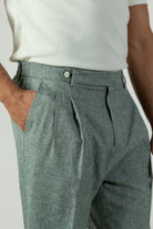 alt="Jack Morgan greenish grey slim fresco trouser formal with extended tab closure front close view"