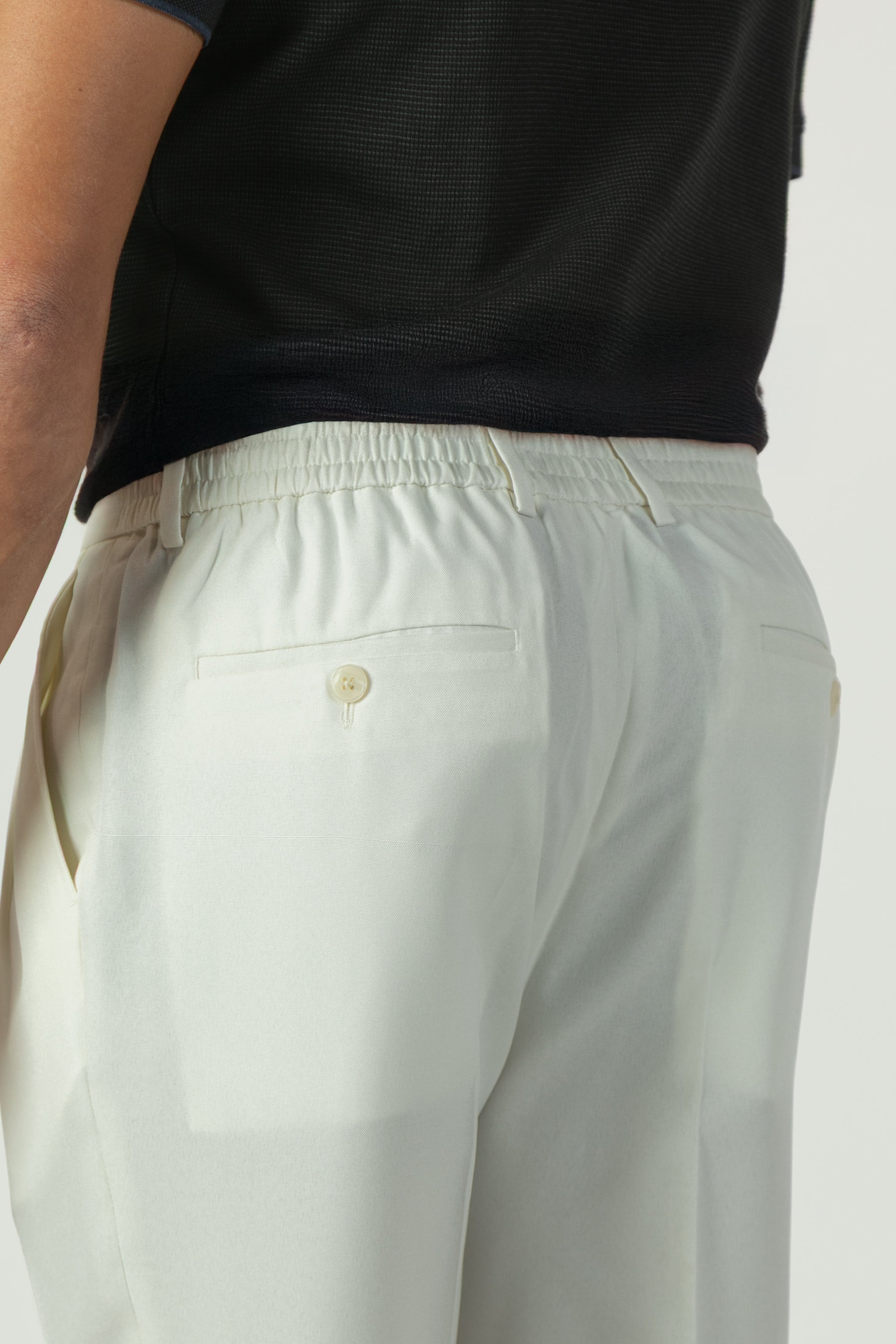 alt="Jack Morgan off white slim fresco trouser formal with extended tab closure back view"