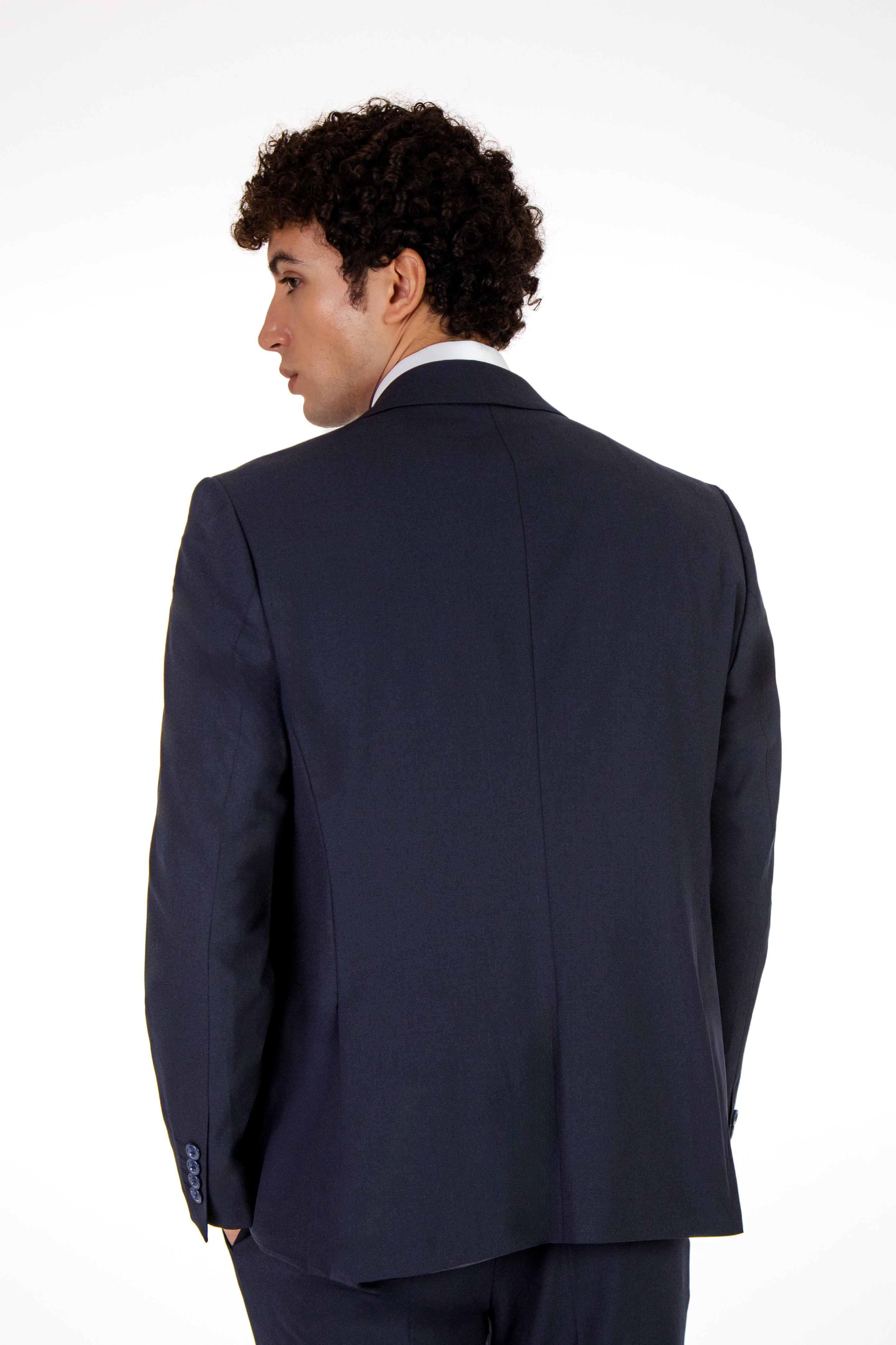alt="JACK MORGAN slim solid suit formal 2 button 2 vent with vest navy back view"