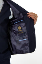 alt="JACK MORGAN slim solid suit formal 2 button 2 vent with vest navy side pocket view"