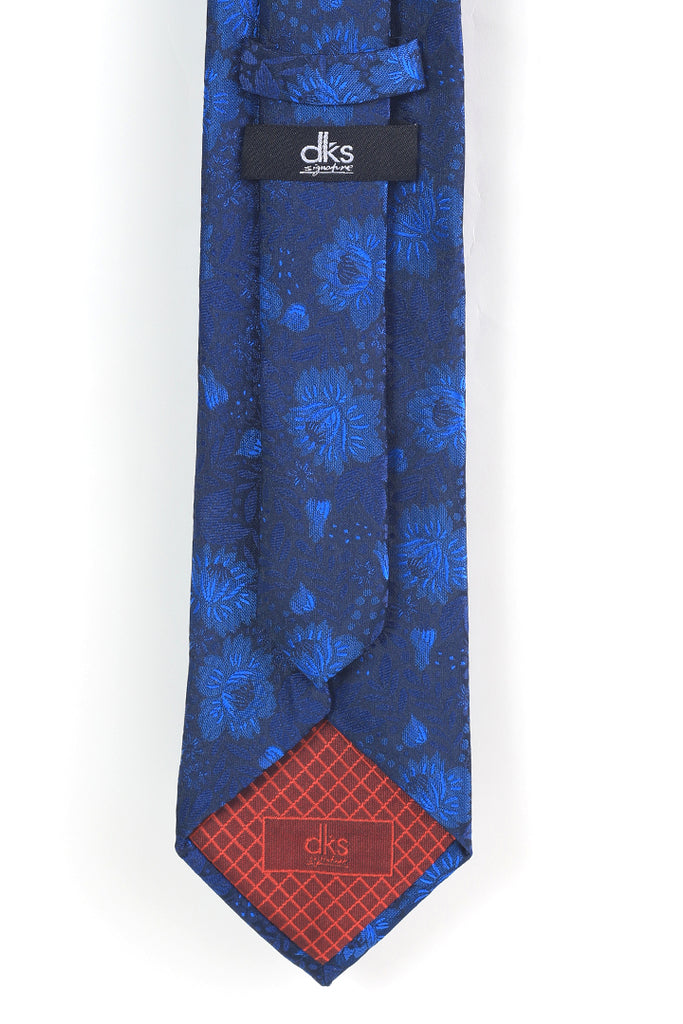 DKS signature slim navy tie with floral design is beautifully curated by designers from the best fabric which is long lasting. The DKS signature slim navy tie with floral design is highly in demand. Check out the DKS signature slim navy with floral design tie online at the best prices. 